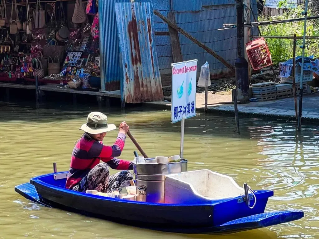 A vendor in Damnoen Saduak Floating Market
