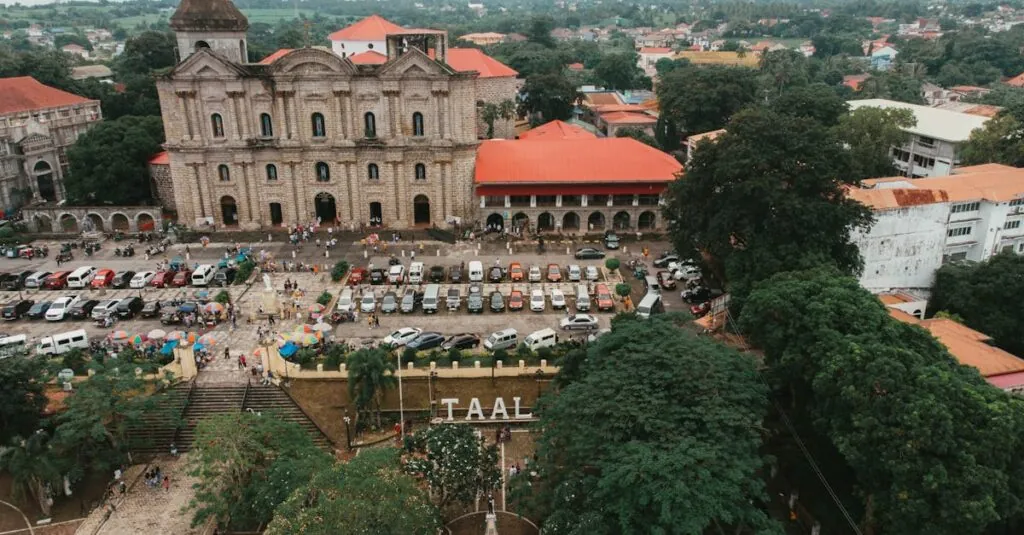 Stunning aerial view of Taal Basilica and surrounding town in the Philippines, showcasing historic architecture.