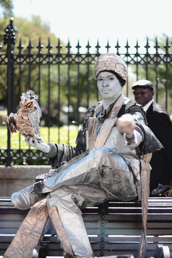 human statue street performer