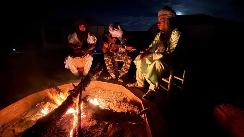 arawan luxury desert camping, late night camp fire, local music, sahara desert
