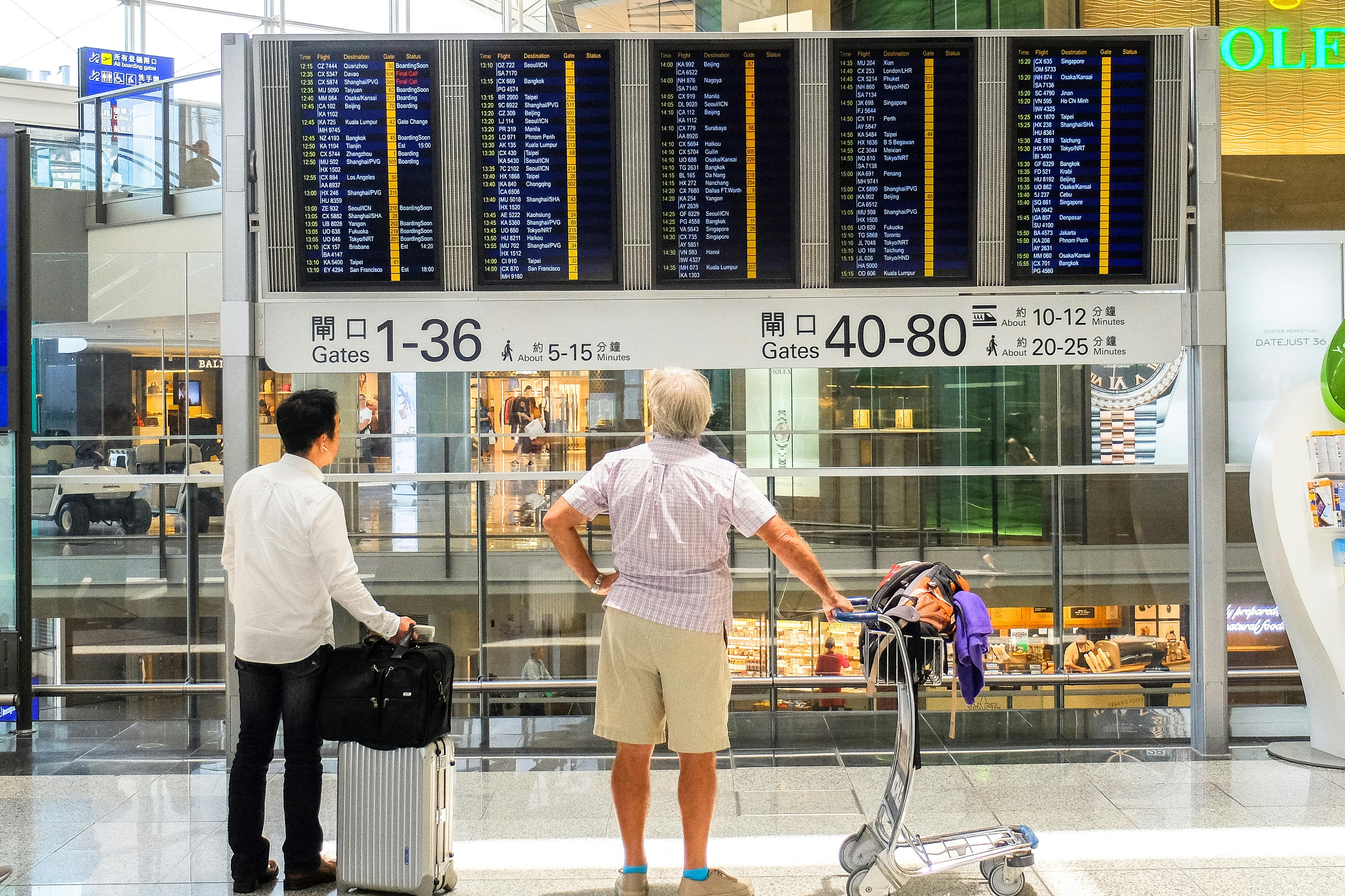 bags at airport, men at airport