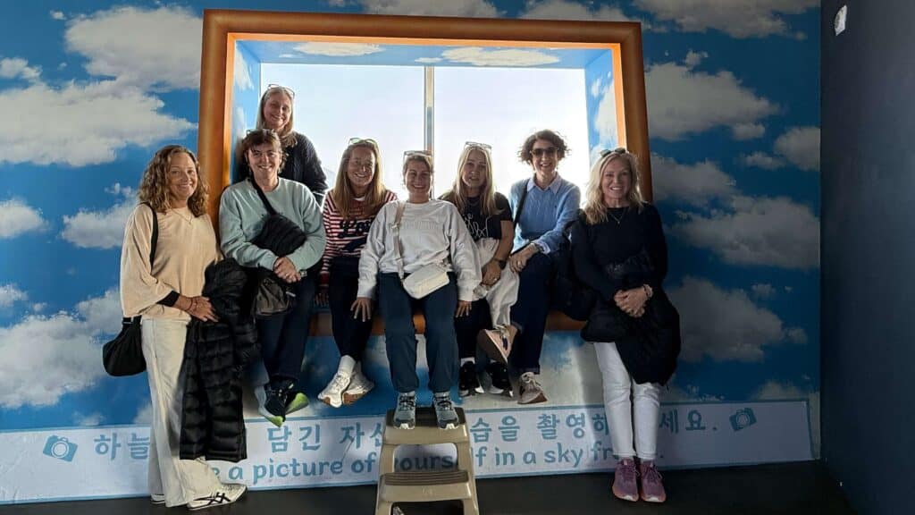 sitting in front of the window at the Busan tower, Busan Tower