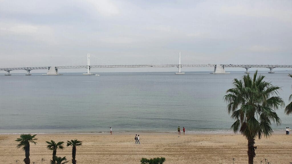 Scenic view of Gwangalli Beach and Gwangandaegyo Bridge in Busan, South Korea.